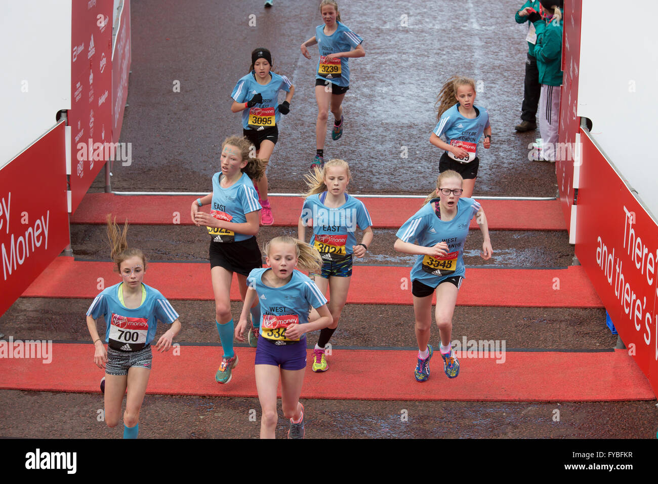 Virgin Money Giving Mini London Marathon Stock Photos Virgin Money - the mall london uk 24th april 2016 girls finish the virgin money